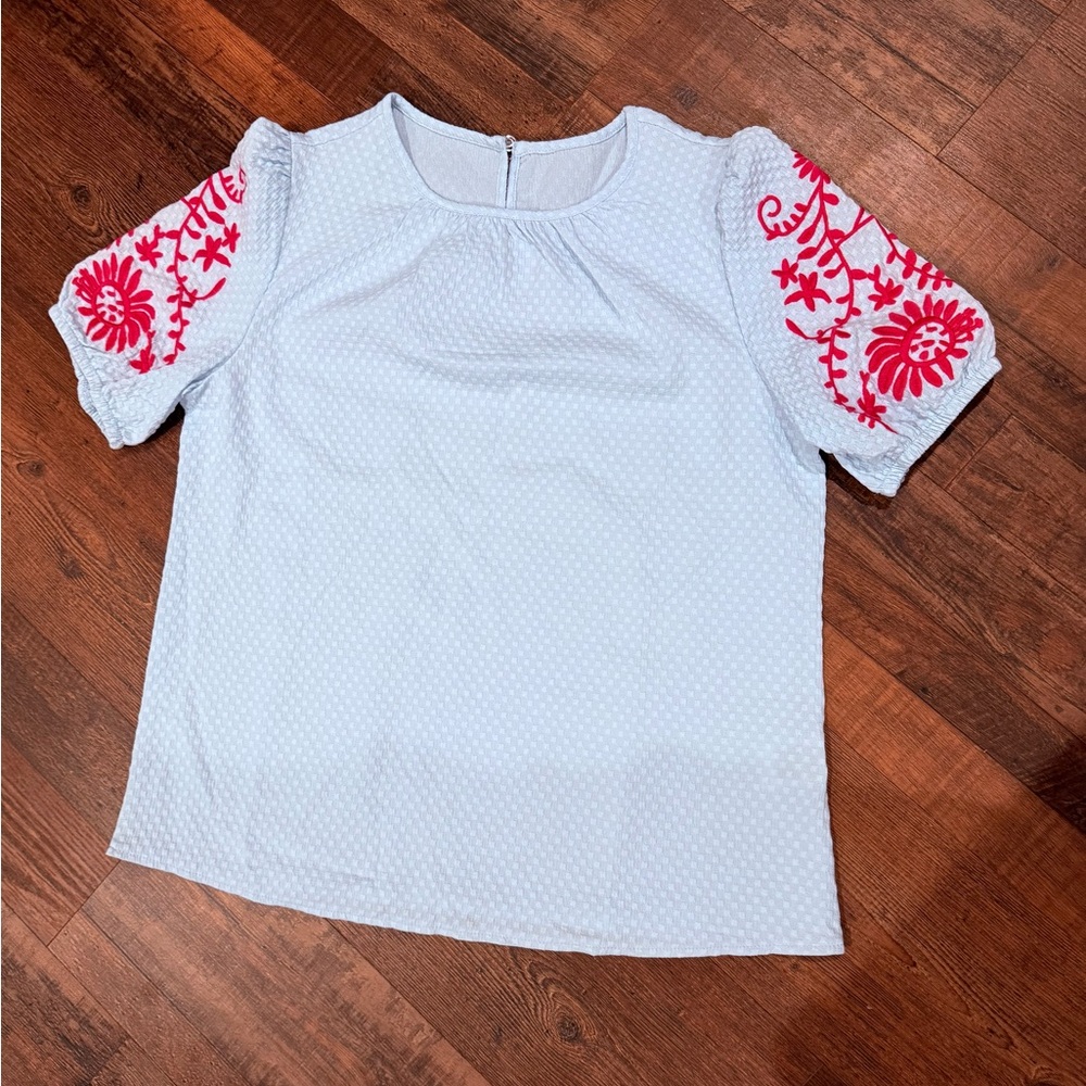 Women’s light blue Embroidered Sleeve Top with Pink Floral Detail